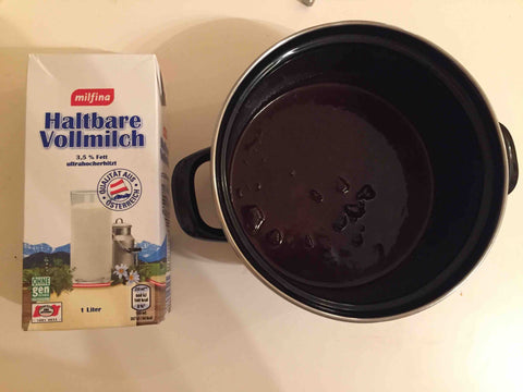 Milk and Pot with melting Chocolate