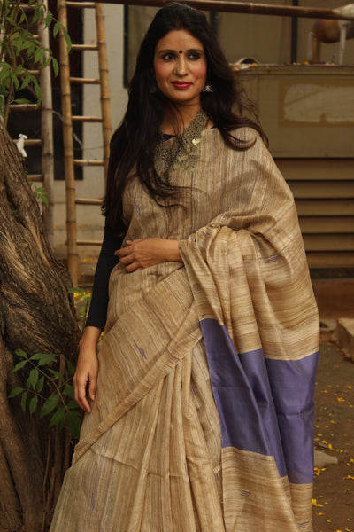 | Purples and Beiges | - Pure tussar silk saree in beige.
