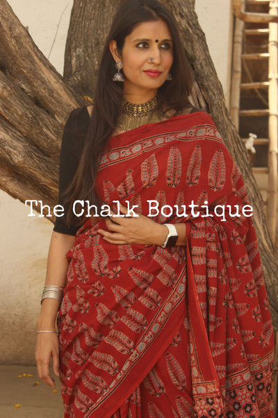 { Roses } Red Handwoven vegetable dyed Ajrakh mul cotton saree .