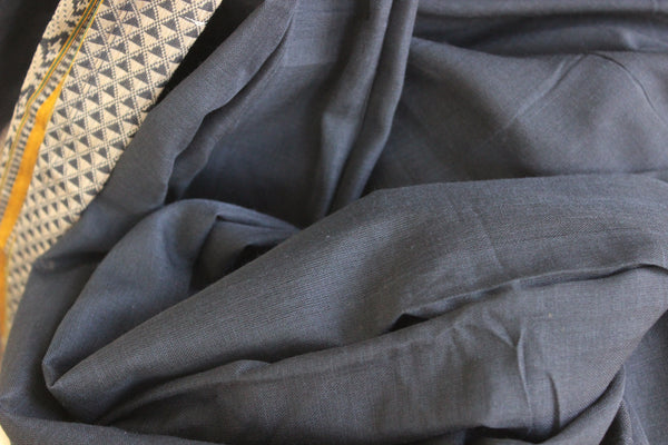 | Warm Glow | Black Soft Cotton Saree With Contrast Broad Border.