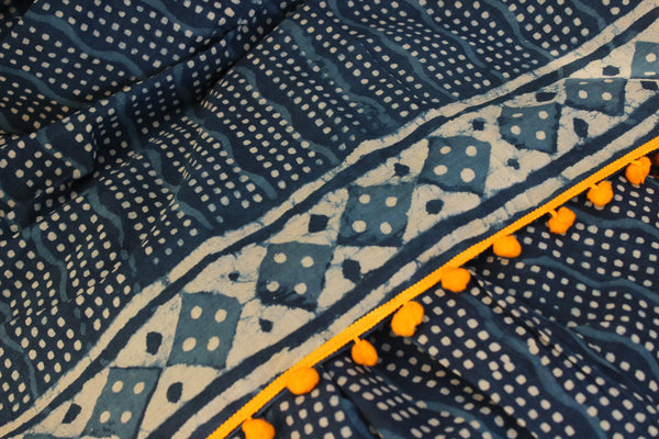 | Neeli Chameli | Indigo hand block printed dabu saree with pompom border.