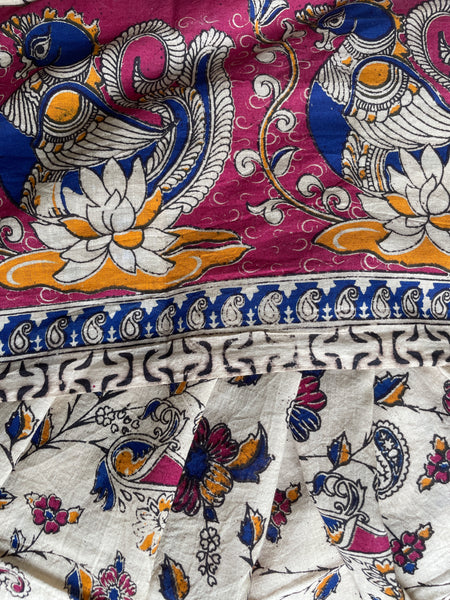 | Aster | Beige Floral kalamkari cotton saree with pink border.