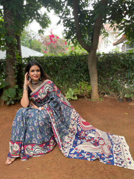 | Magical Summers | Blue Floral kalamkari cotton saree with border.