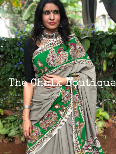 Grey with green broad border soft cotton kalamkari saree.