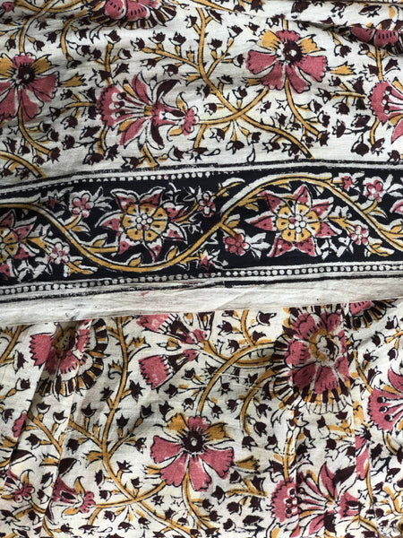 | Shringar | Floral Overall kalamkari saree with thin border.