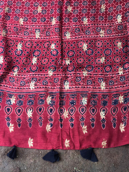 Madder vegetable dyed Ajrakh Silk saree with zari border.