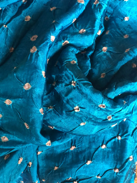 | Blue Star | Blue vegetable dyed Ajrakh saree with bandhani in modal Silk.