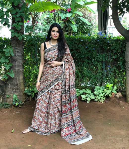 | Cherry Plum | Floral Overall kalamkari saree with thin border.