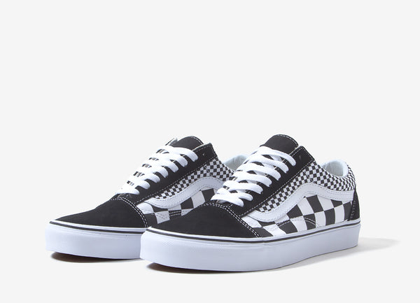 mixed checkerboard slip on vans