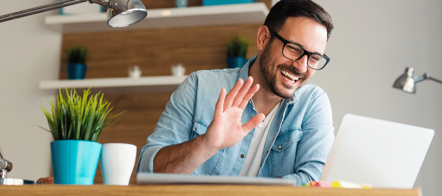 Man talking to coworkers remotely during covid 19 quarantine