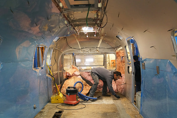 The inside of the airstream getting the insulation replaced with fresh stuff.
