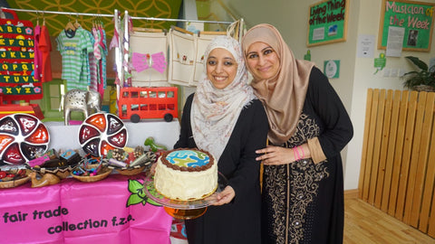 Saima and Sabeena with the World Fair Trade Day Cake 2016 - Dubai, UAE