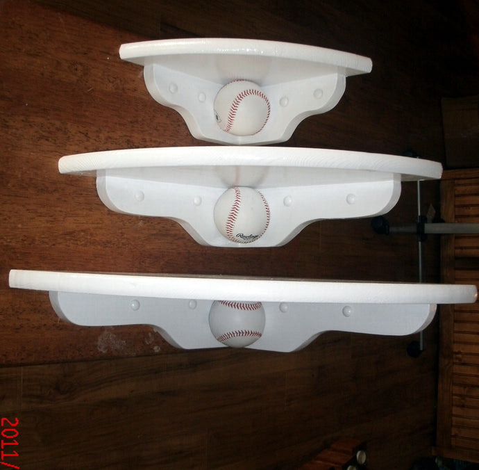 Corner shelves with baseballs