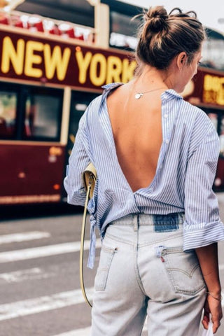 striped shirt and gold necklace