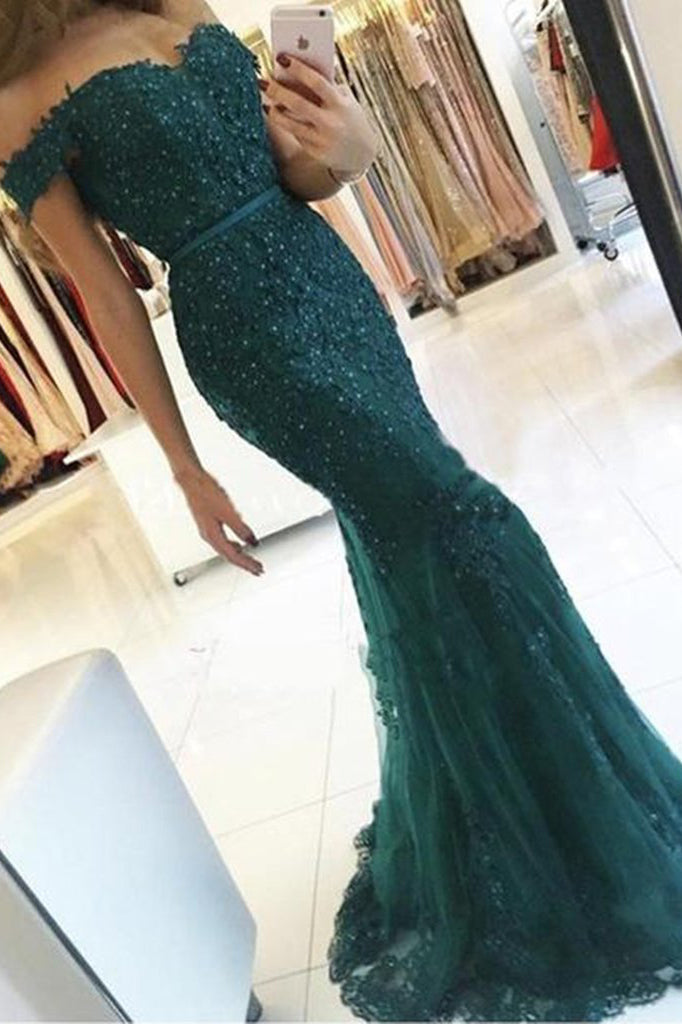 emerald green fishtail prom dress