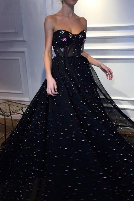 strapless black tulle dress