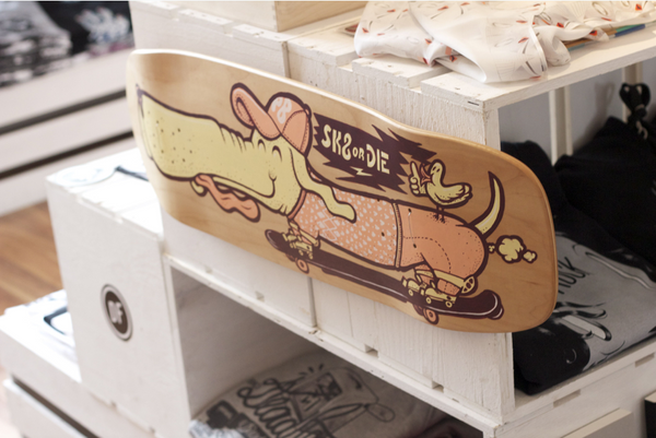 Unique skateboard with street art design at Wild Wood street art store and gallery in Kassel, Germany