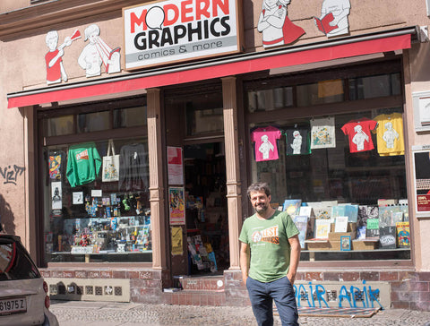 Micha Wiesler in front of his comic and bookshop Modern Graphics in Berlin, Kreuzberg
