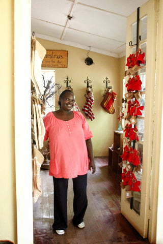 photo of maggie in amani kenya shop