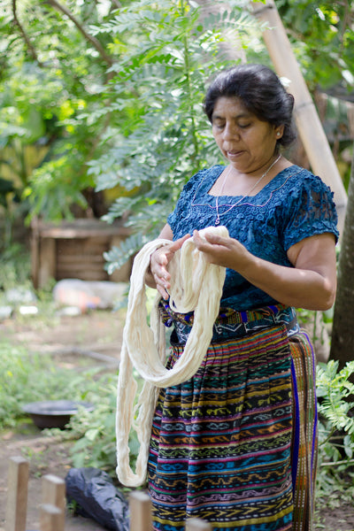 Long-term artisan partner Rosa prepares textiles for dying, authentic naturally died products, Guatemala ethical fashion, maya weavers