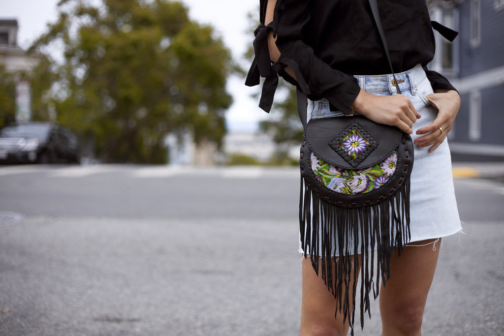 Style blogger @uniquelyyani styles Hiptipico on the streets of San Francisco for a style that transitions from day to night, ethically crafted handbags, artisan crafted leather bags, coolest fringe leather cross body bags,