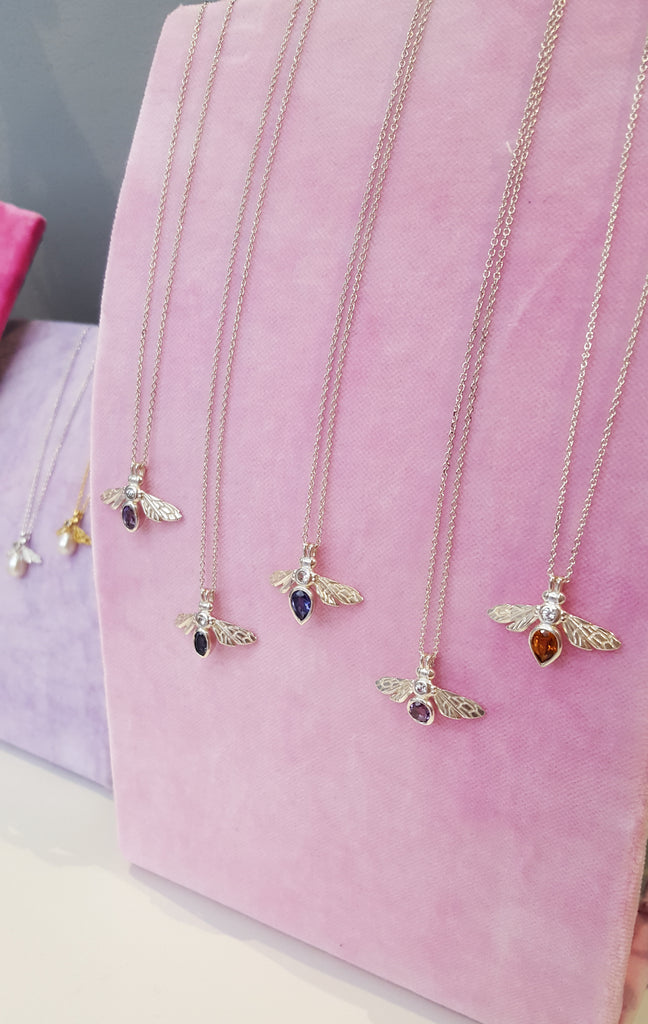 Rachel Whitehead Jewellery IJL view of gemstone bee necklaces