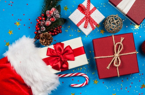 A picture of presents against a blue background.