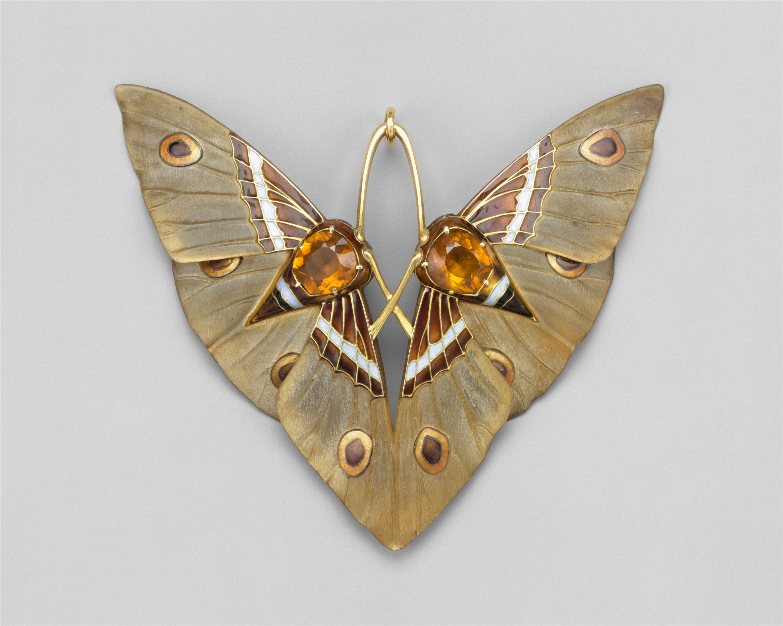 Gold and enamel moth pendant with carved horn and Citrines 