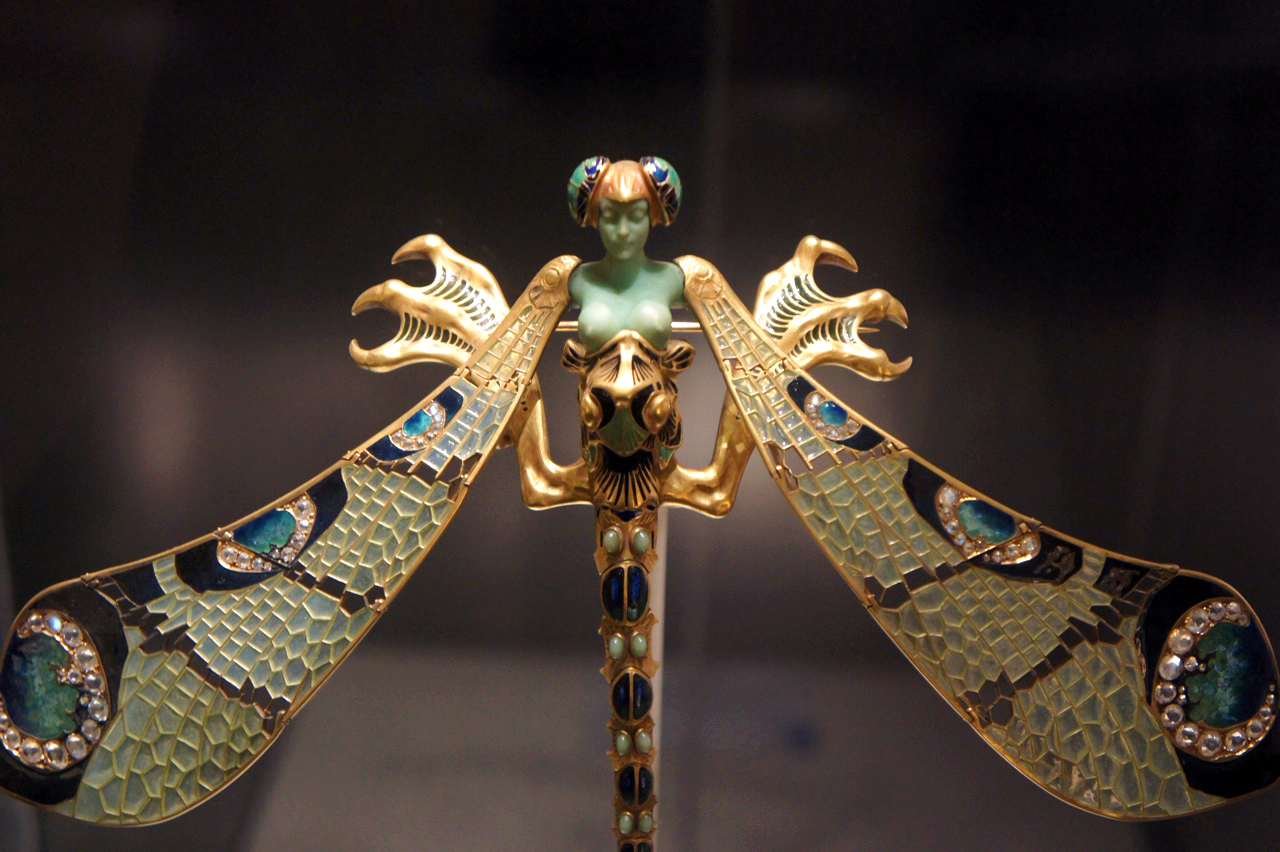 Dragonfly-woman brooch made of Gold, enamel, chrysoprase, chalcedony, moonstones, and Diamonds 