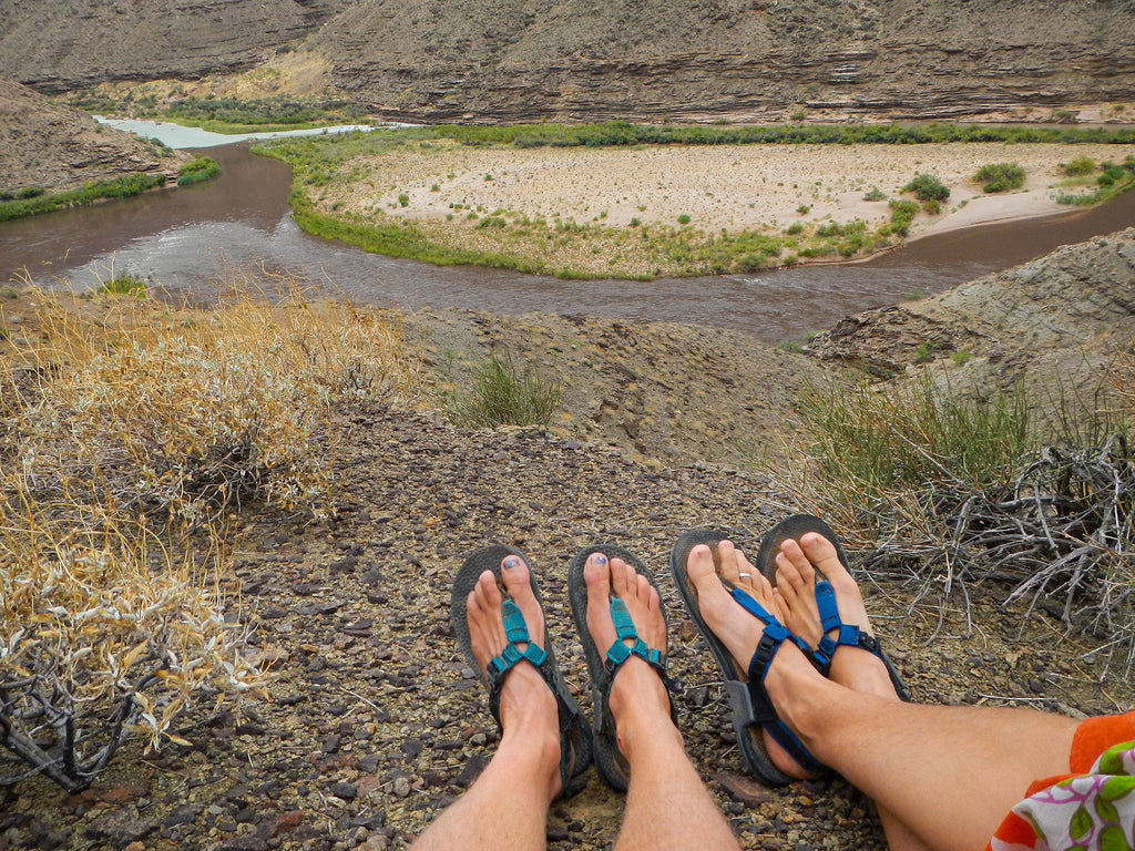 POV of two guides feet wearing Bedrock Sandals