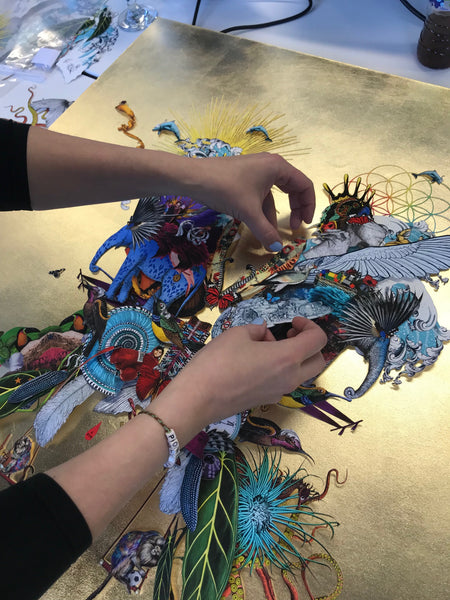 Kristjana S Williams works on the 3D collage that forms the blueprint for Coldplay's latest album A Head Full of Dreams: Live in Buenos Aires and Live in Sao Paulo