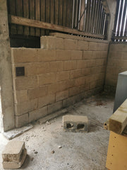 removing a concrete wall from the bullshed