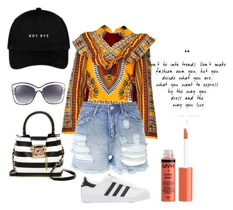 Yellow dashiki Victoria Top from A Leap of Style styled casually with distressed denim shorts, black and white striped bag, and adidas sneakers, boy bye hat