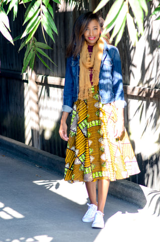African print midi skirt from A Leap of Style with vintage tee, scarf, denim jacket, and sneakers 
