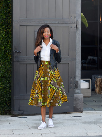 African print skirt with leather jacket and converse sneakers from A Leap of Style