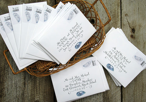 calligraphy envelopes with custom oyster shell stamp