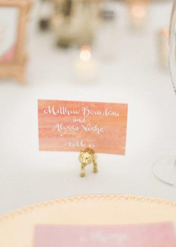 white calligraphy escort cards