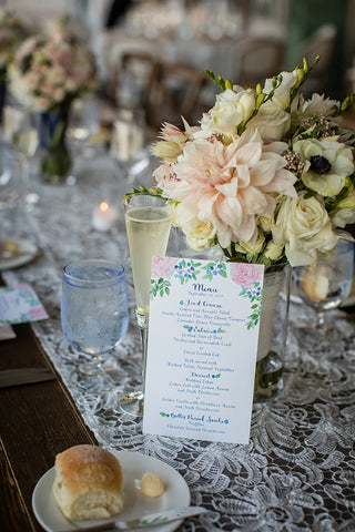peony and blueberry menu for wedding day table
