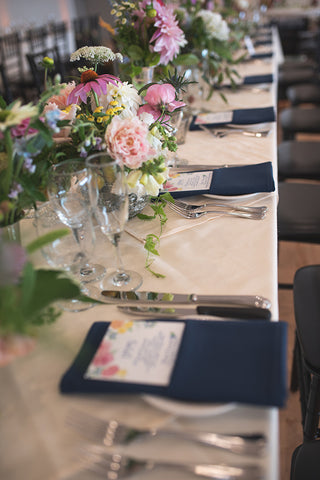 row of menus on wedding table