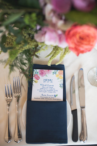 custom menu in navy napkin