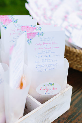 ceremony program with petals in bag