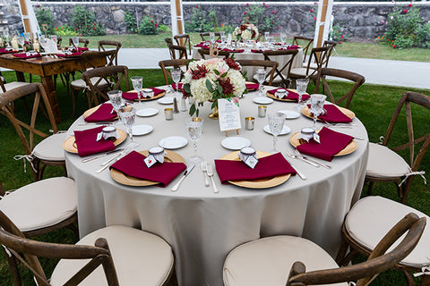 table with place settings and jam jars