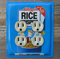 Double outlet cover outlet cover custom made from a Kelloggs Rice Krispies tin.