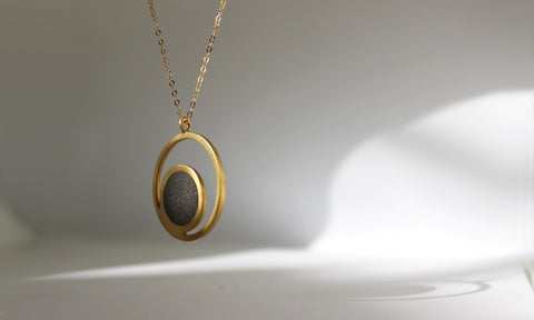 Orbit Concrete Necklace in Gold, by BAARA Jewelry. Motherhood Jewelry, Minimal Necklace, Statement Necklace, Cement Pendant, Circular Long Necklace