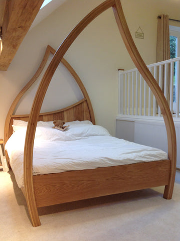 Oak Four Poster Bed with teddy bear in it !
