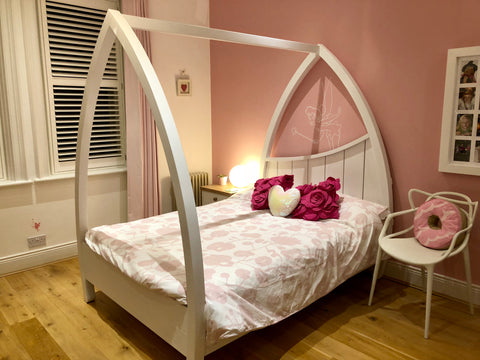 White Wooden Four Poster Bed