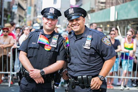 Police supporting LGBT by wearing flags at NYC PRIDE