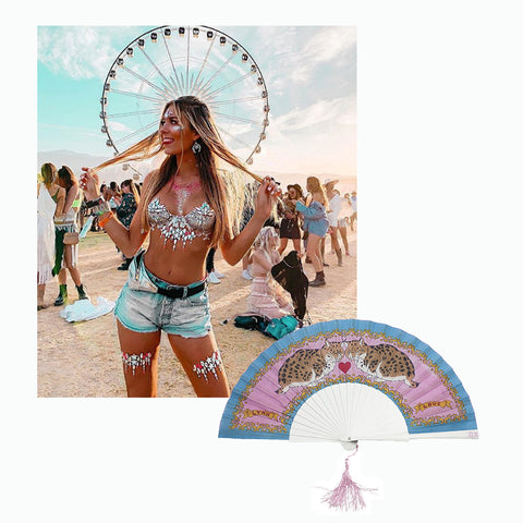 Photo of instagrammer @AmericanStyle at Coachella 2019 wearing shorts and glitter top plus Khu Khu LOVE LYNX hand fan