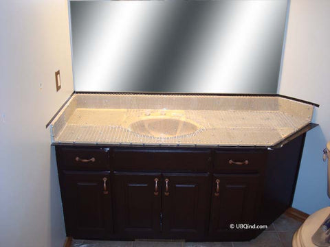 Applying wire mesh to countertop surface