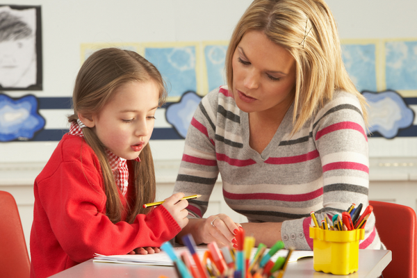 Blonde hair female teacher with child